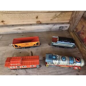 Post-war 1949-52 Unique Lines Windup four car‎ set. Scarce Caboose